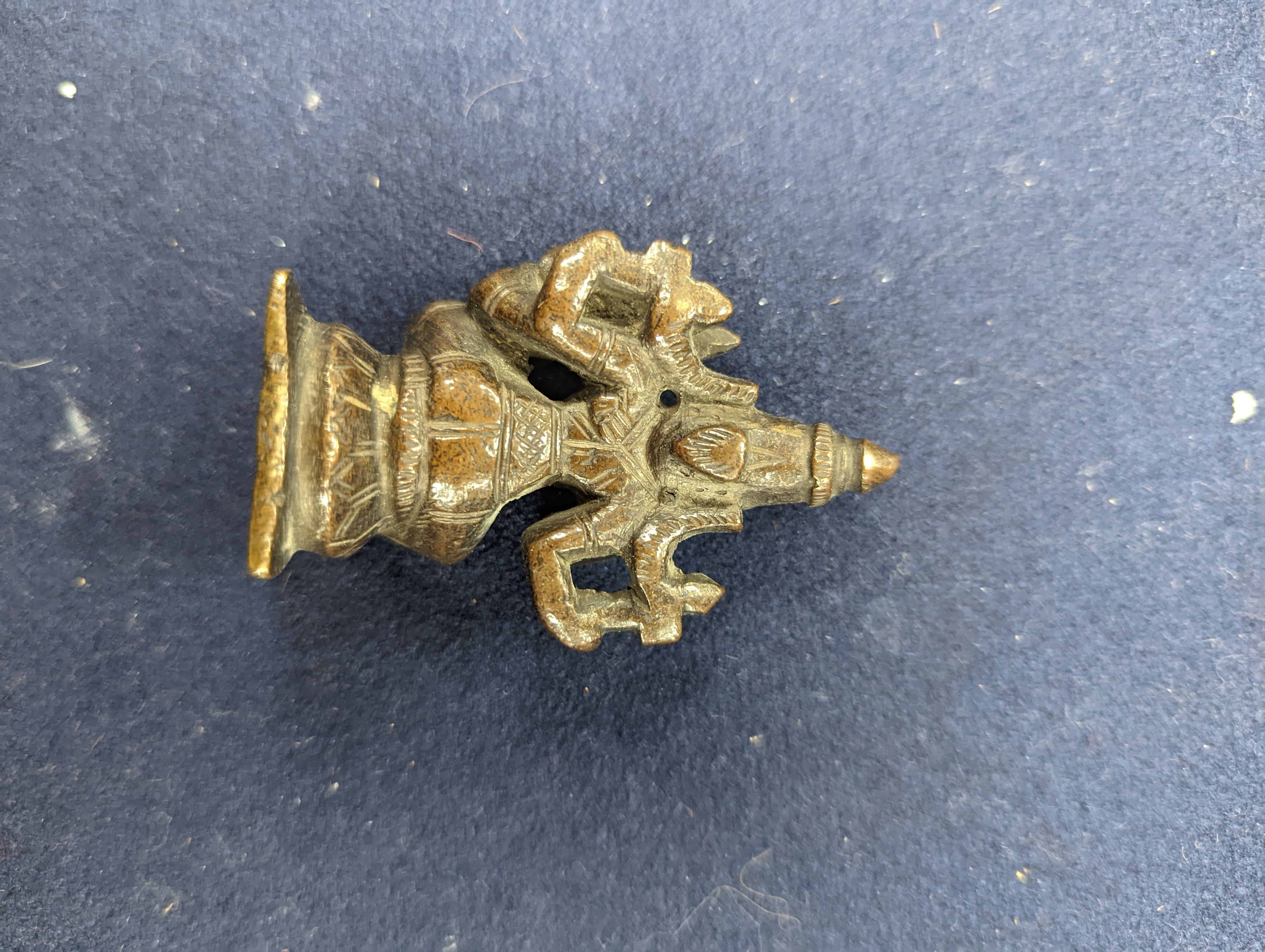 A Chinese gilt copper figure, a Chinese Dog of Fo, a bell, a censer, six Indian bronze figures and a scroll box